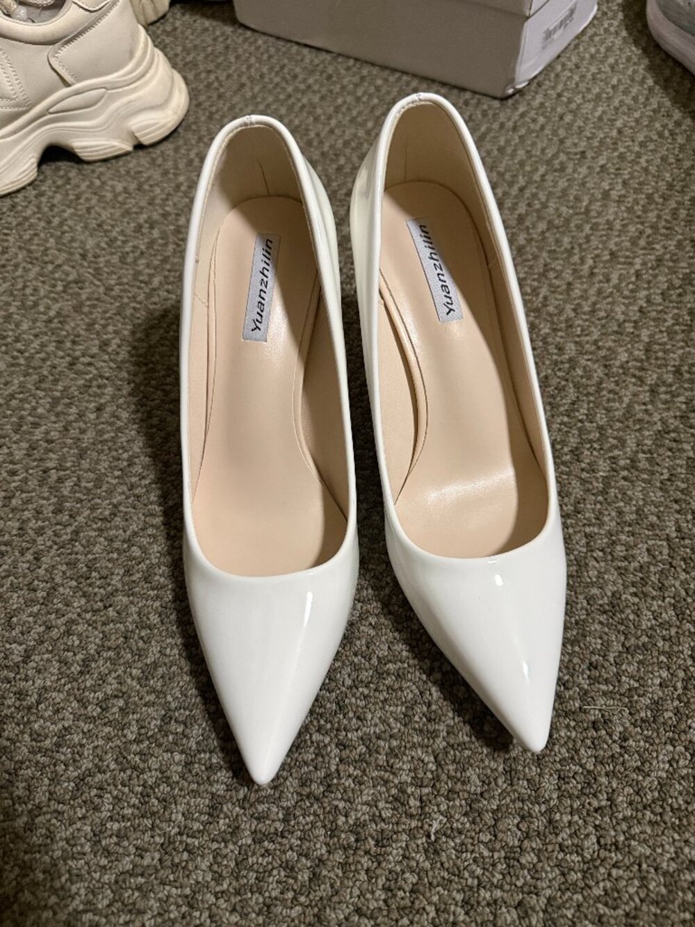 White stiletto pumps